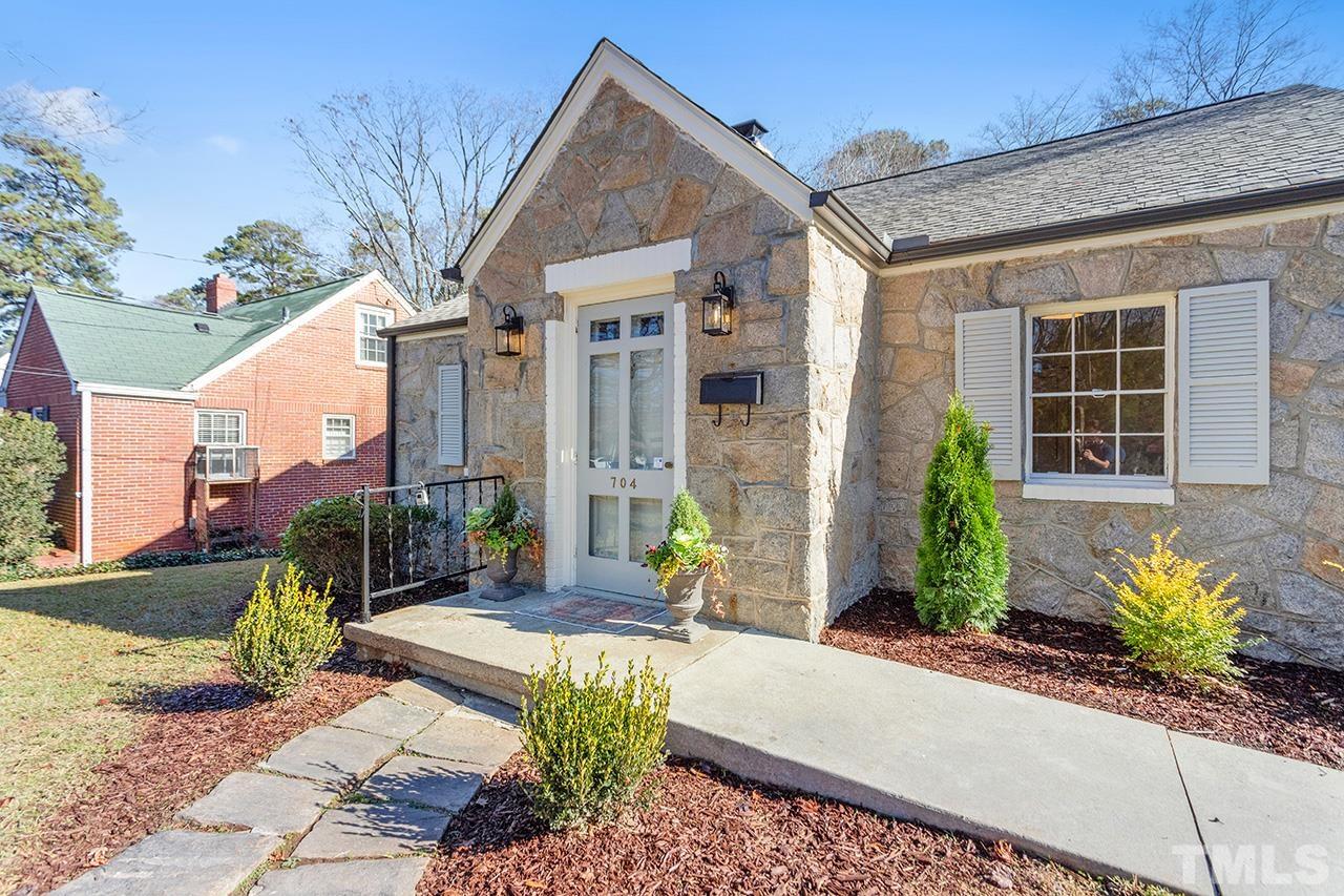 704 Dixie Trail Raleigh, NC 27607 - Photo 3 of 31 a view of a house with potted plants