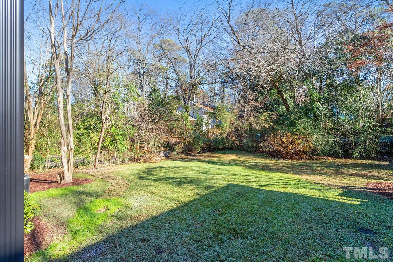 704 Dixie Trail Raleigh, NC 27607 - Photo 5 of 31 a view of a yard with a trees