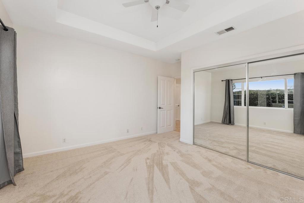 6456 Franciscan Road Carlsbad, CA 92011 - Photo 30 of 43 a view of an empty room with a window