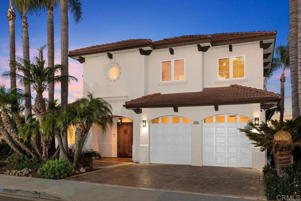 6456 Franciscan Road Carlsbad, CA 92011 - Photo 3 of 43 a front view of a house with a yard