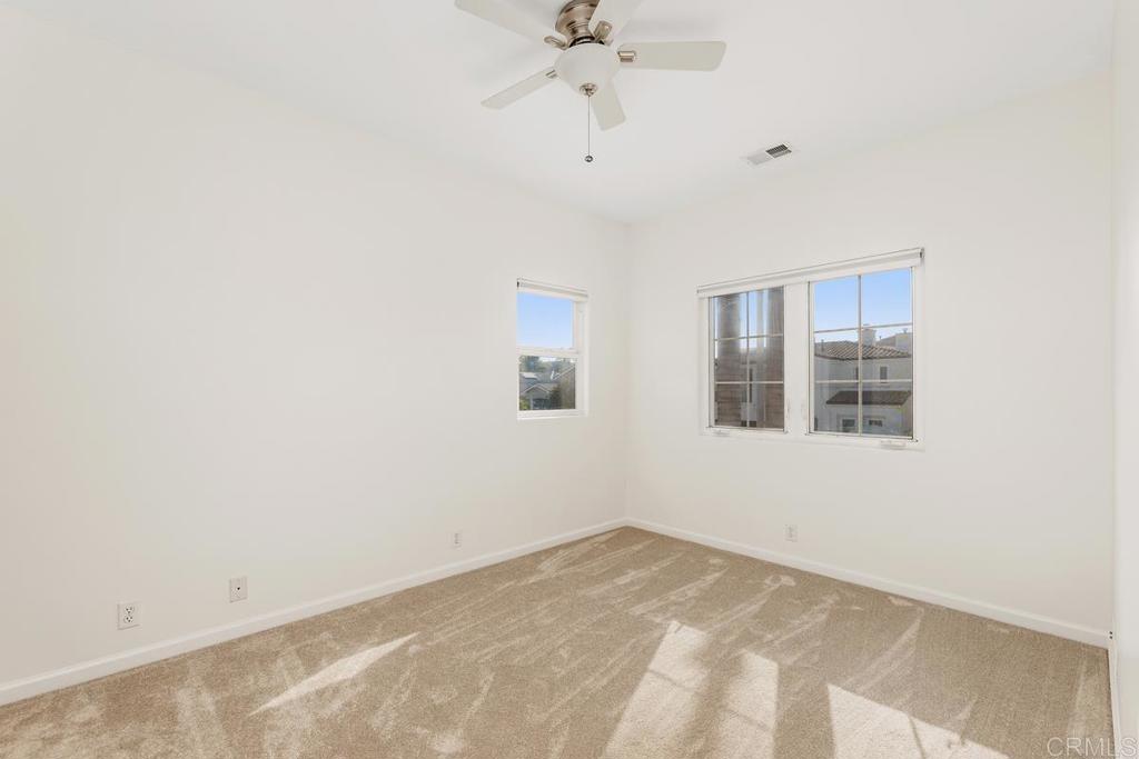 6456 Franciscan Road Carlsbad, CA 92011 - Photo 31 of 43 a view of an empty room with a window