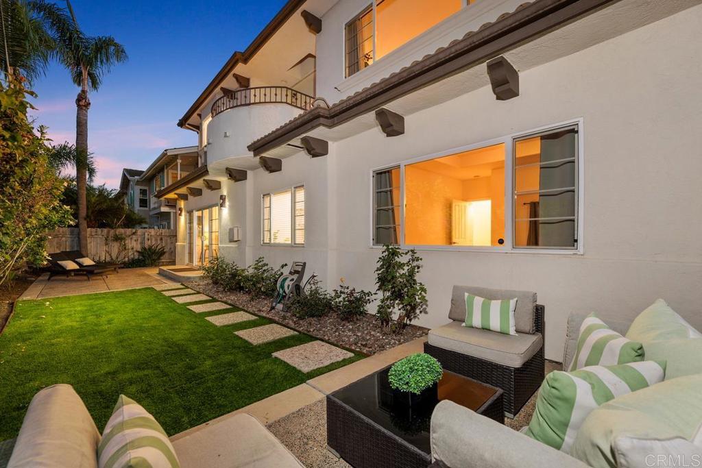 6456 Franciscan Road Carlsbad, CA 92011 - Photo 34 of 43 a view of a house with a couches in patio