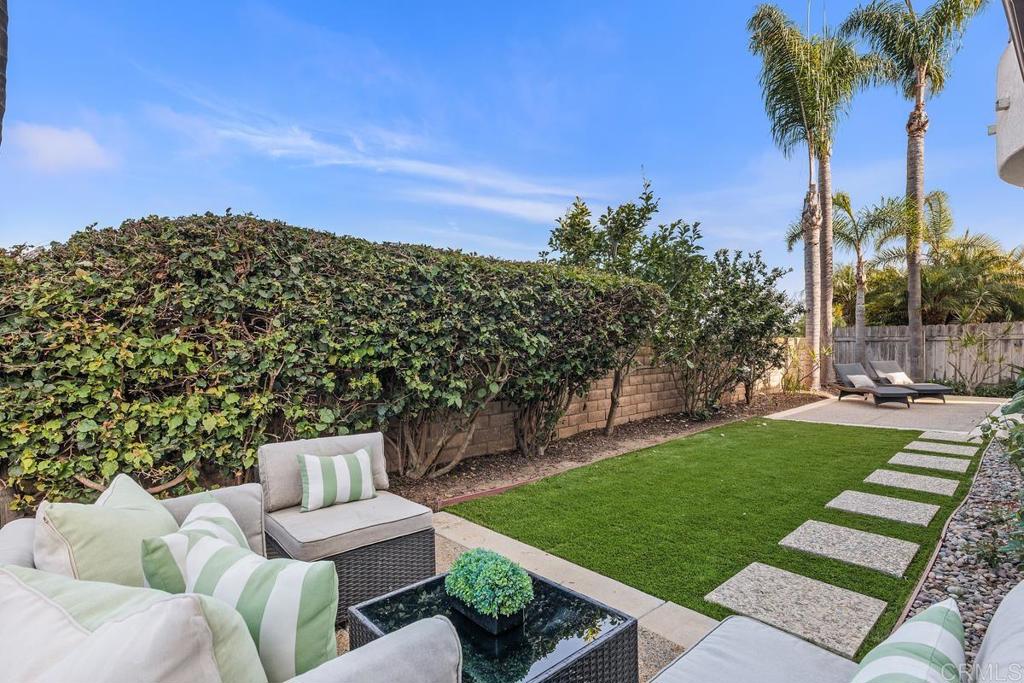 6456 Franciscan Road Carlsbad, CA 92011 - Photo 35 of 43 a view of a chairs and table in the backyard