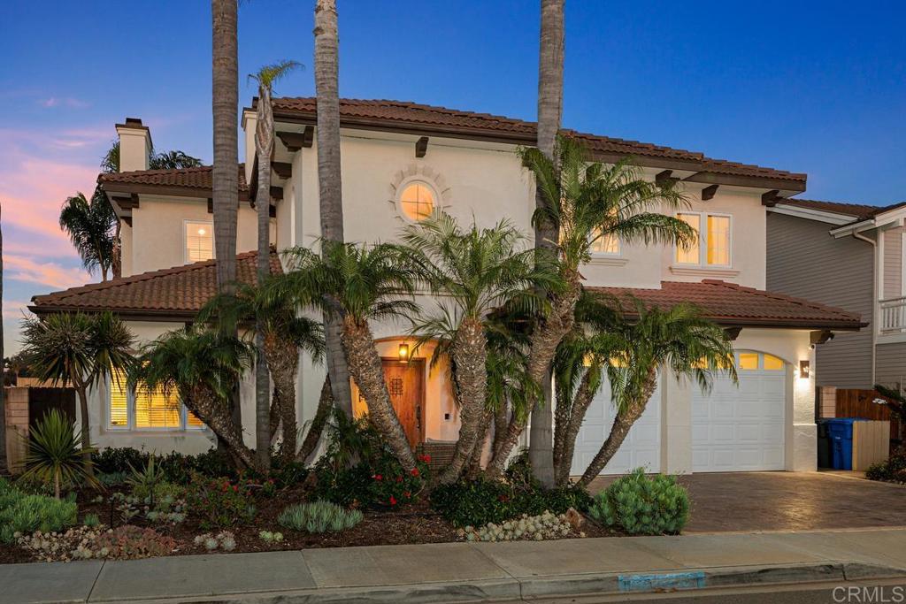 6456 Franciscan Road Carlsbad, CA 92011 - Photo 39 of 43 a front view of a house with a yard
