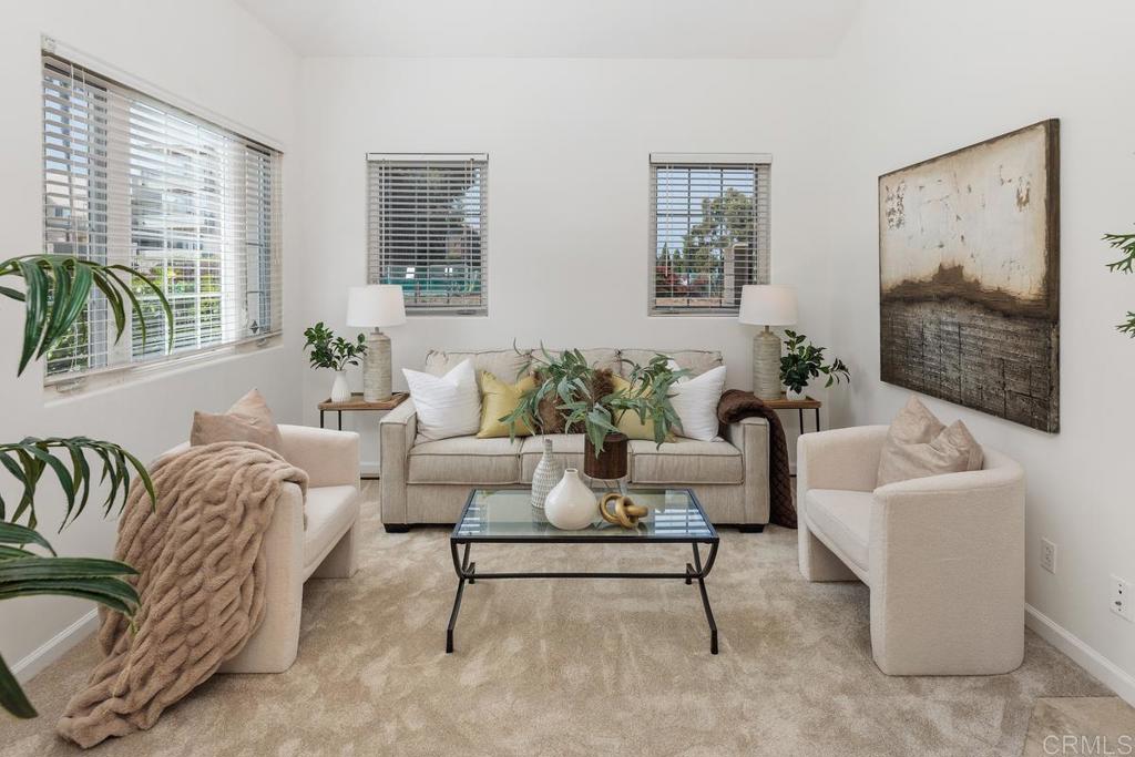 6456 Franciscan Road Carlsbad, CA 92011 - Photo 8 of 43 a living room with furniture and a large window