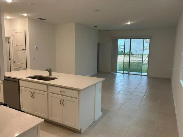 a bathroom with a sink a vanity and a mirror