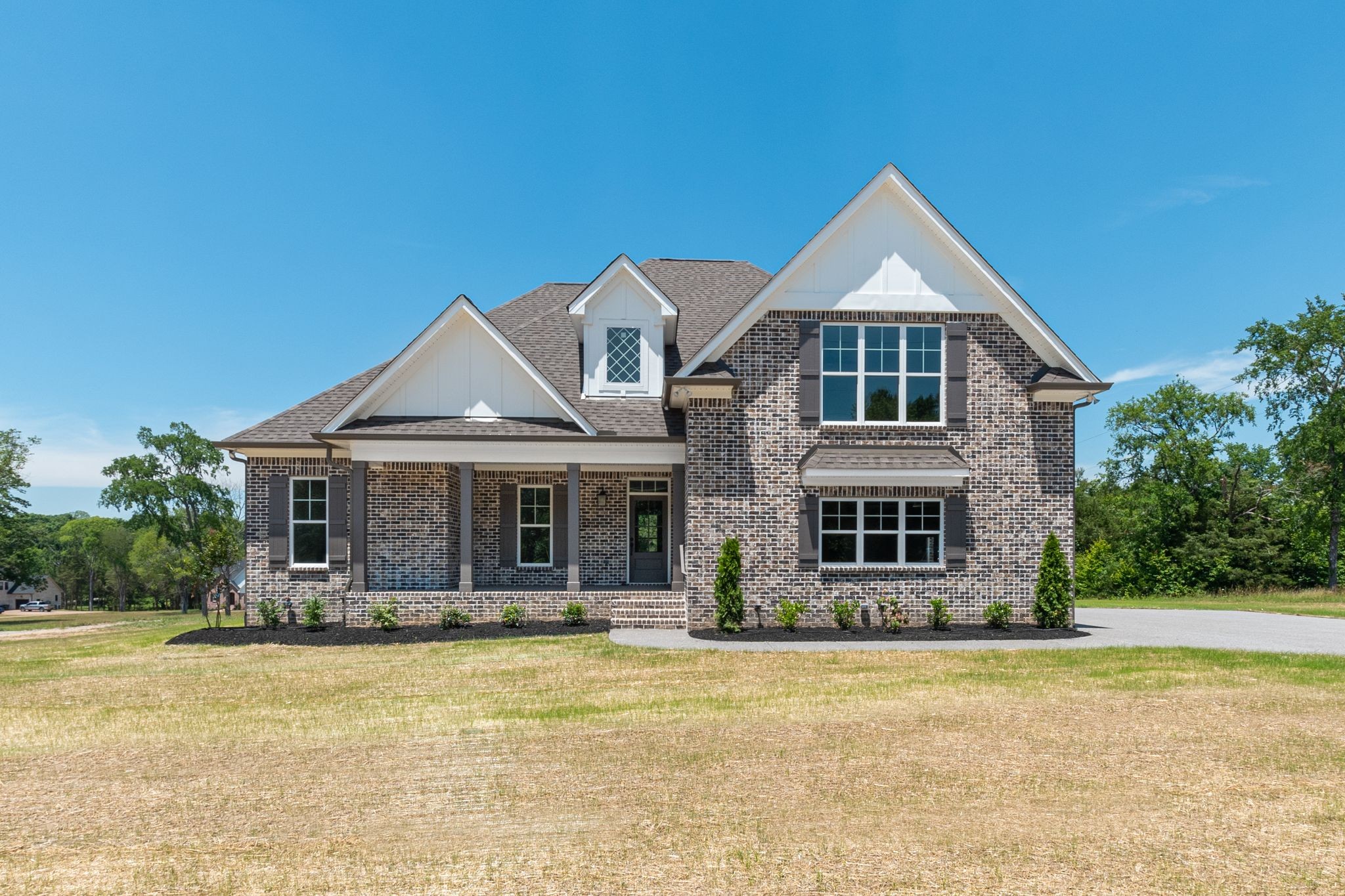 1563 Phillips Road Lebanon, TN 37087 - Photo 1 of 33 a front view of a house with a yard