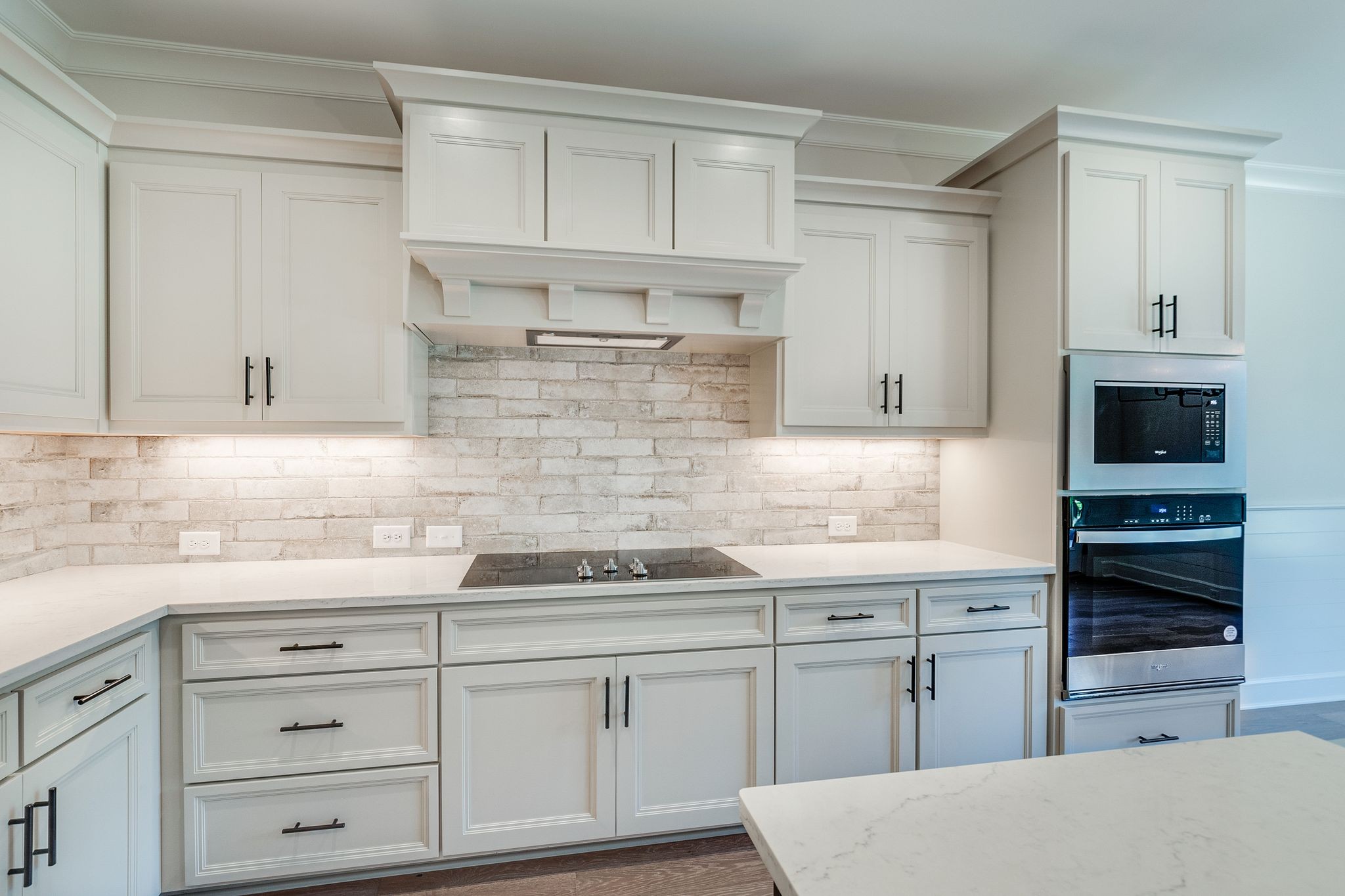 1563 Phillips Road Lebanon, TN 37087 - Photo 12 of 33 a kitchen with granite countertop white cabinets and stainless steel appliances