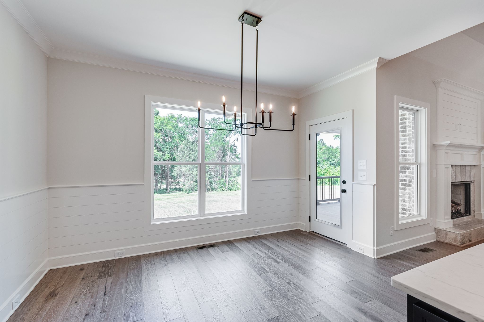 1563 Phillips Road Lebanon, TN 37087 - Photo 14 of 33 a view of empty room with wooden floor and fan