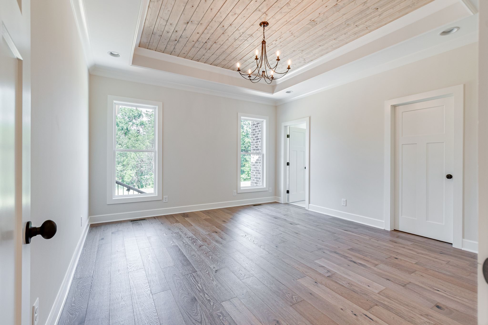 1563 Phillips Road Lebanon, TN 37087 - Photo 17 of 33 wooden floor in an empty room with a window