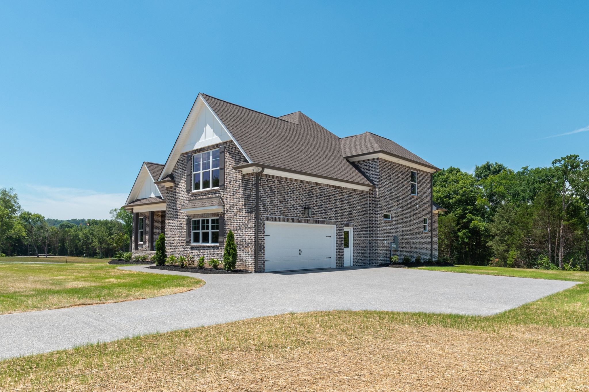 1563 Phillips Road Lebanon, TN 37087 - Photo 2 of 33 a view of a house with a big yard and large trees