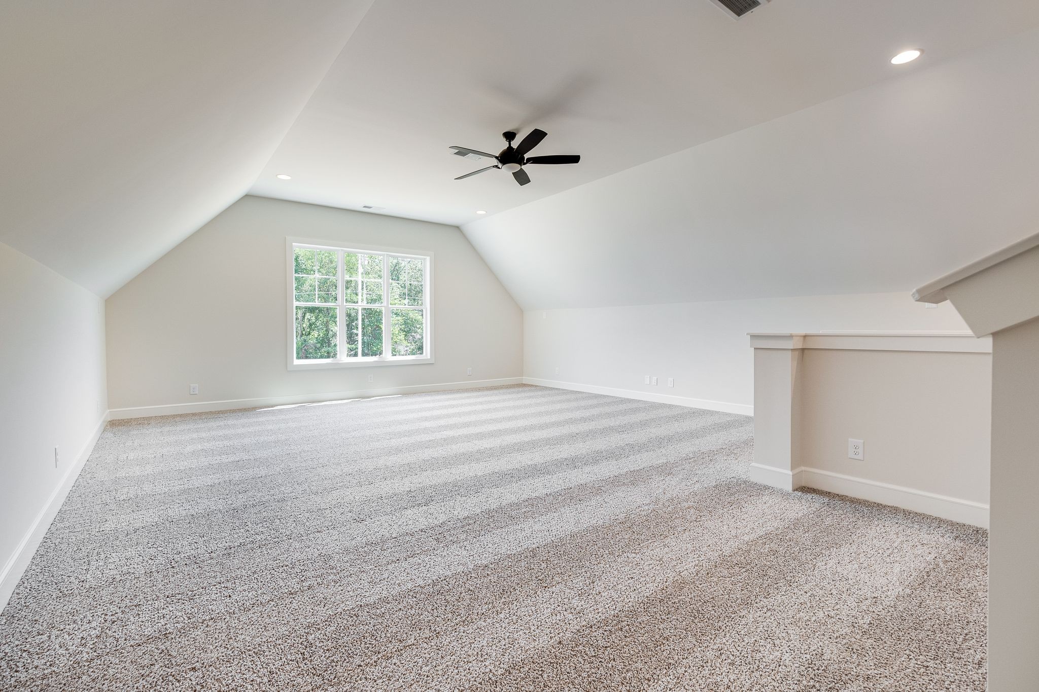 1563 Phillips Road Lebanon, TN 37087 - Photo 26 of 33 an empty room with windows and ceiling fan