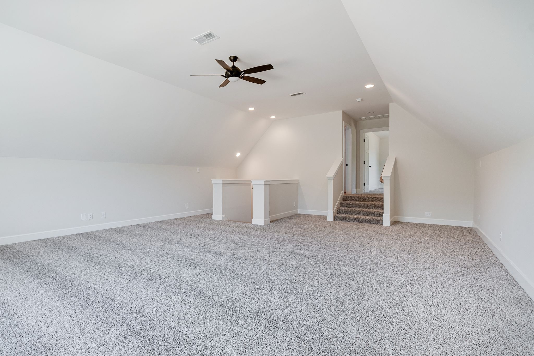 1563 Phillips Road Lebanon, TN 37087 - Photo 27 of 33 an empty room with a ceiling fan and window