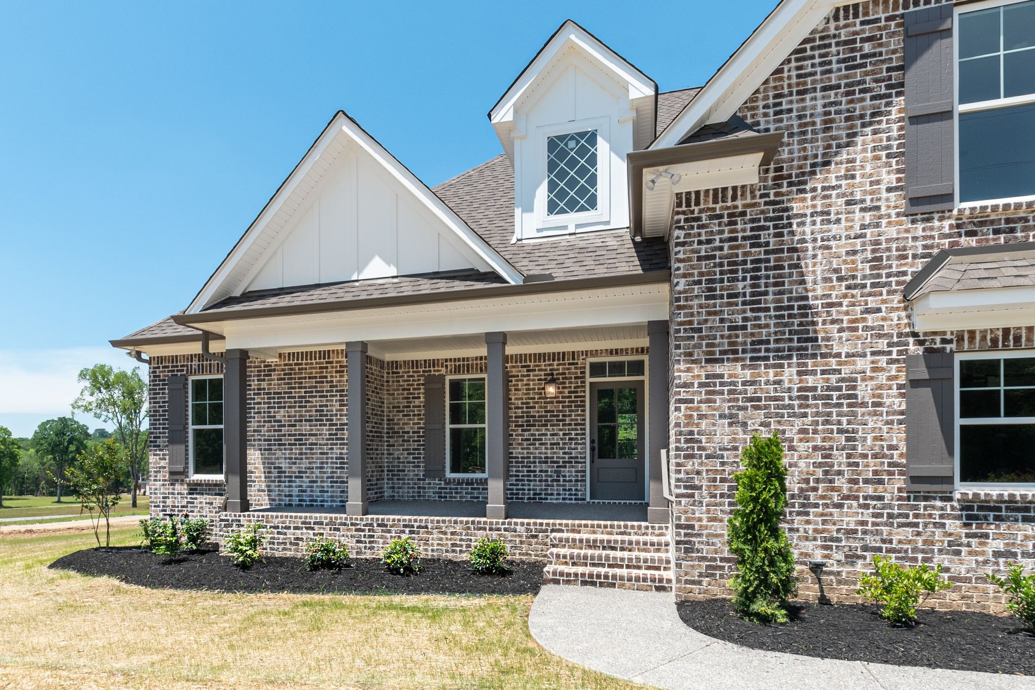 1563 Phillips Road Lebanon, TN 37087 - Photo 3 of 33 a front view of a house with garden