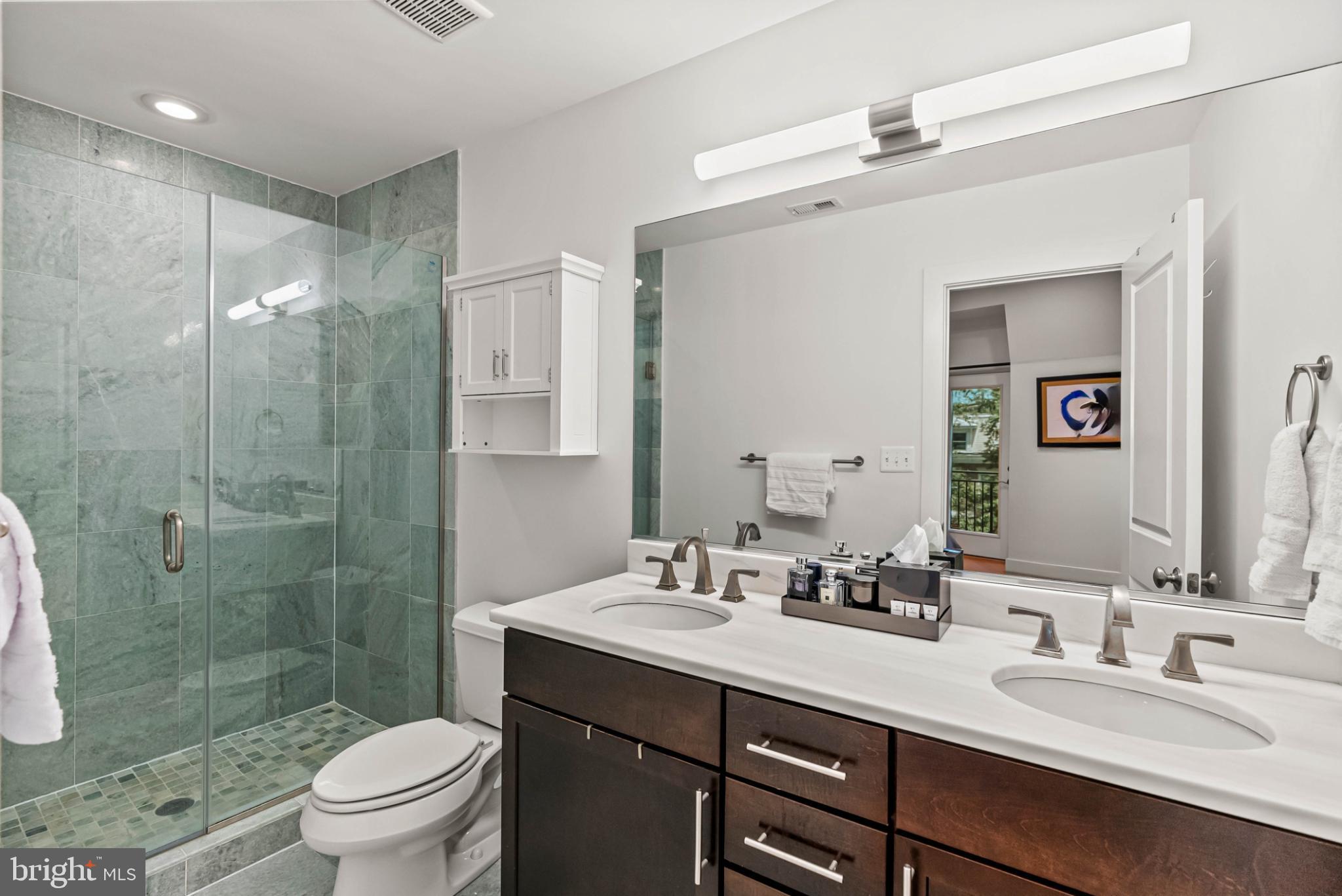 3311 13th Street Northwest, Unit 5 Washington, DC 20010 - Photo 19 of 36 Modern bathroom with sleek finishes.