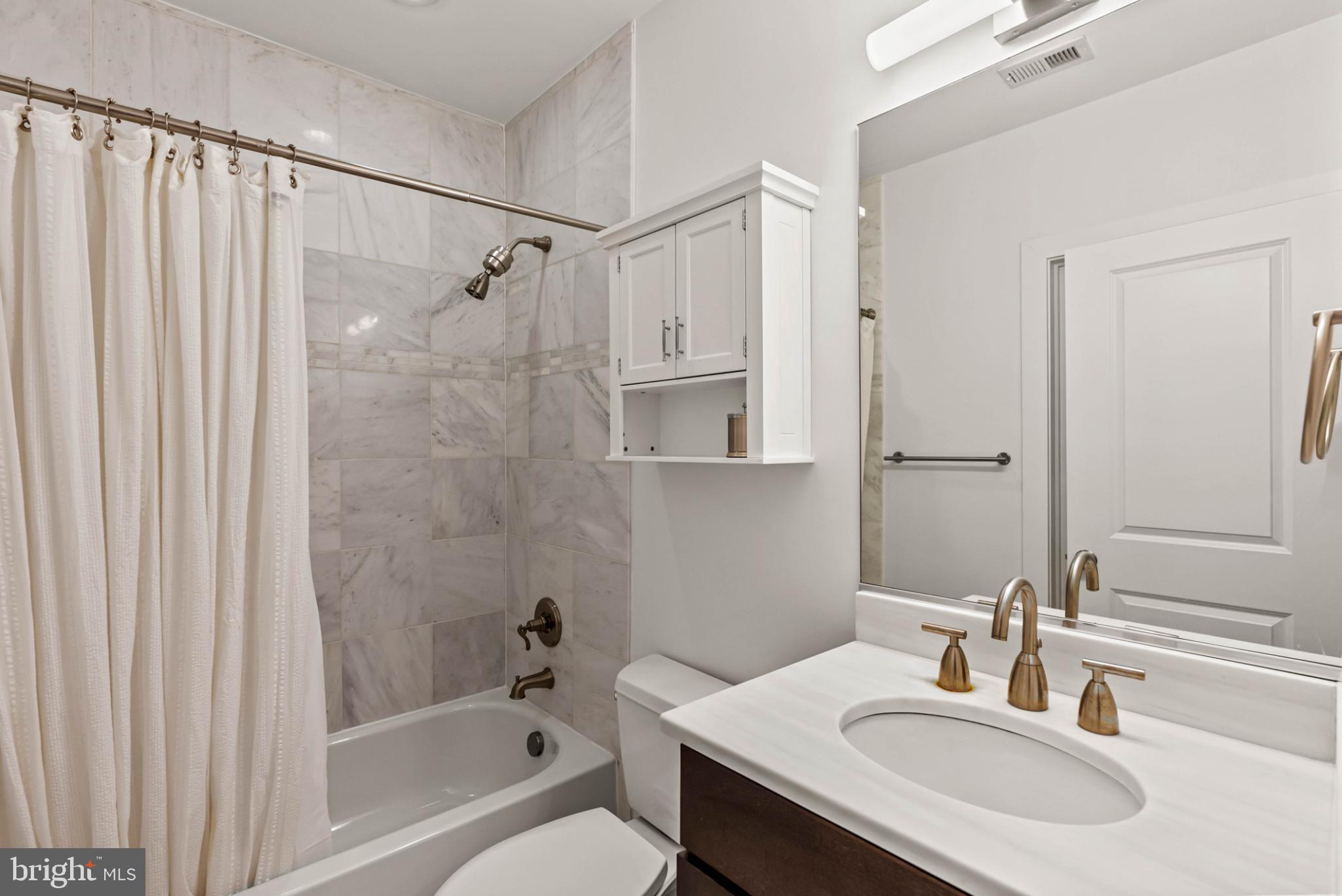 3311 13th Street Northwest, Unit 5 Washington, DC 20010 - Photo 24 of 36 Elegant bathroom with modern finishes.