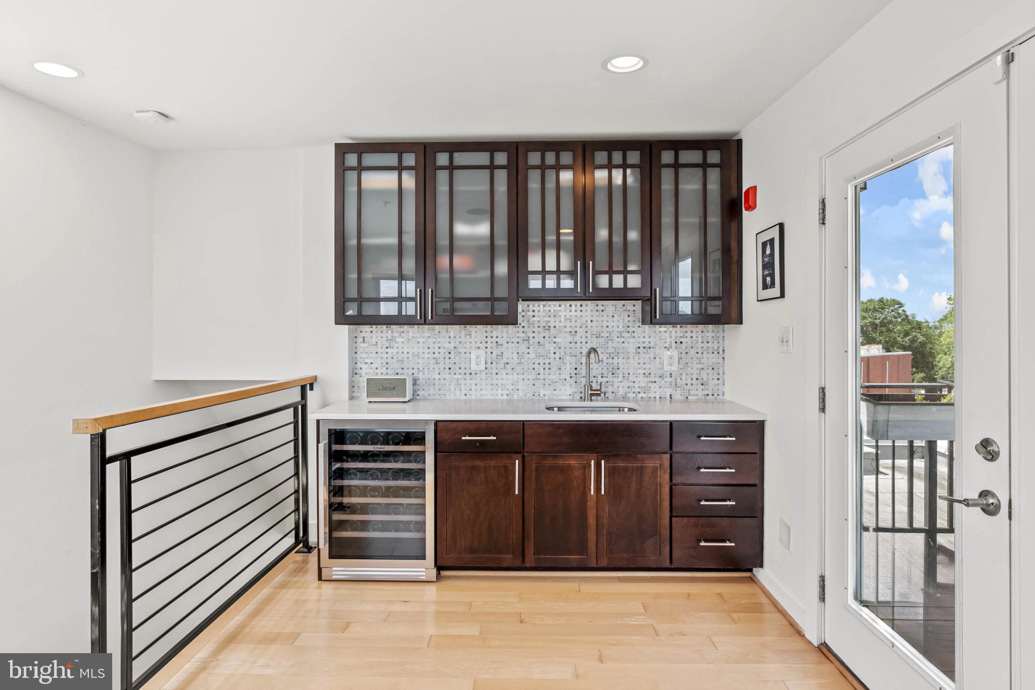 3311 13th Street Northwest, Unit 5 Washington, DC 20010 - Photo 29 of 36 Sleek modern kitchen with stylish finishes.