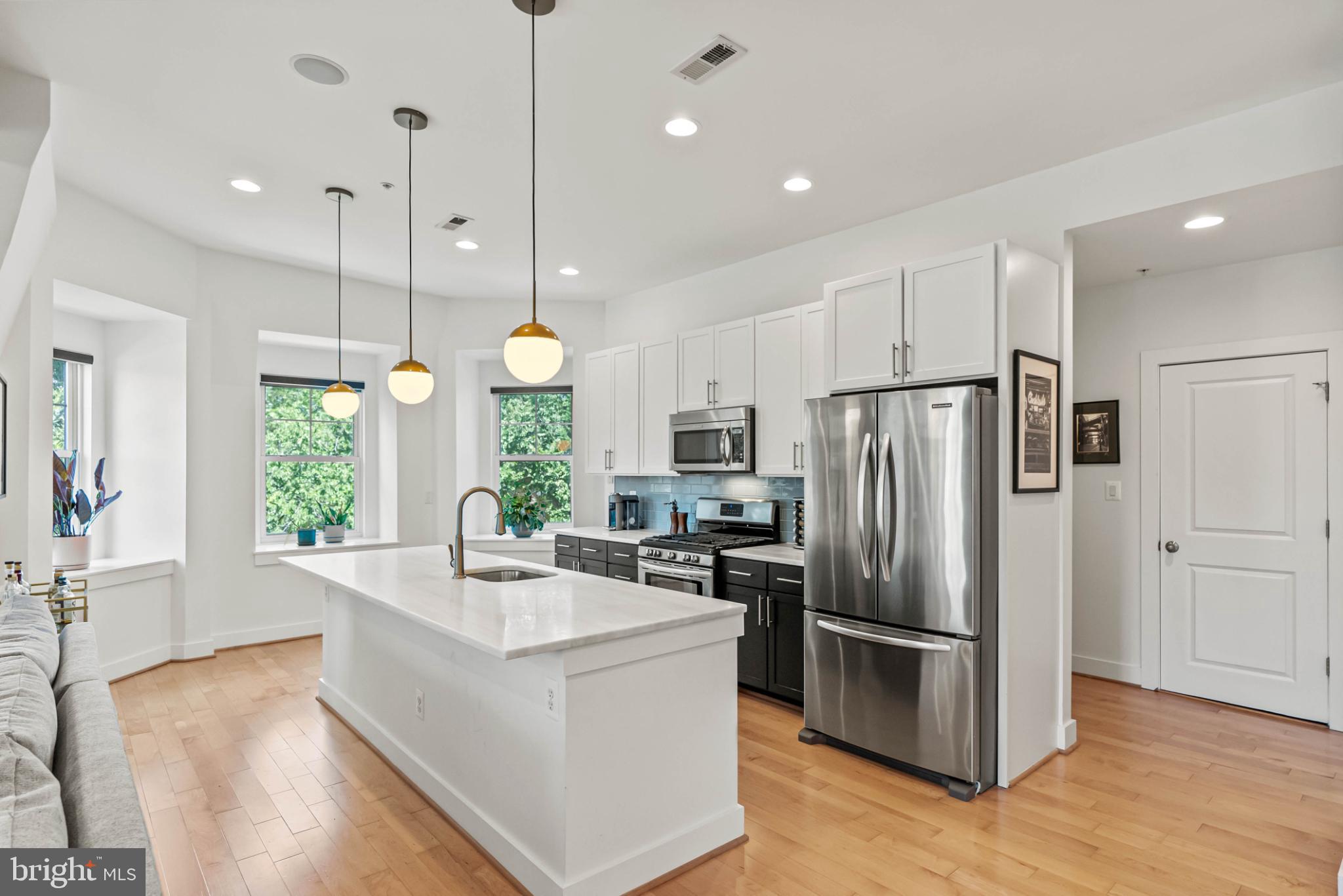 3311 13th Street Northwest, Unit 5 Washington, DC 20010 - Photo 9 of 36 Modern kitchen with sleek finishes.