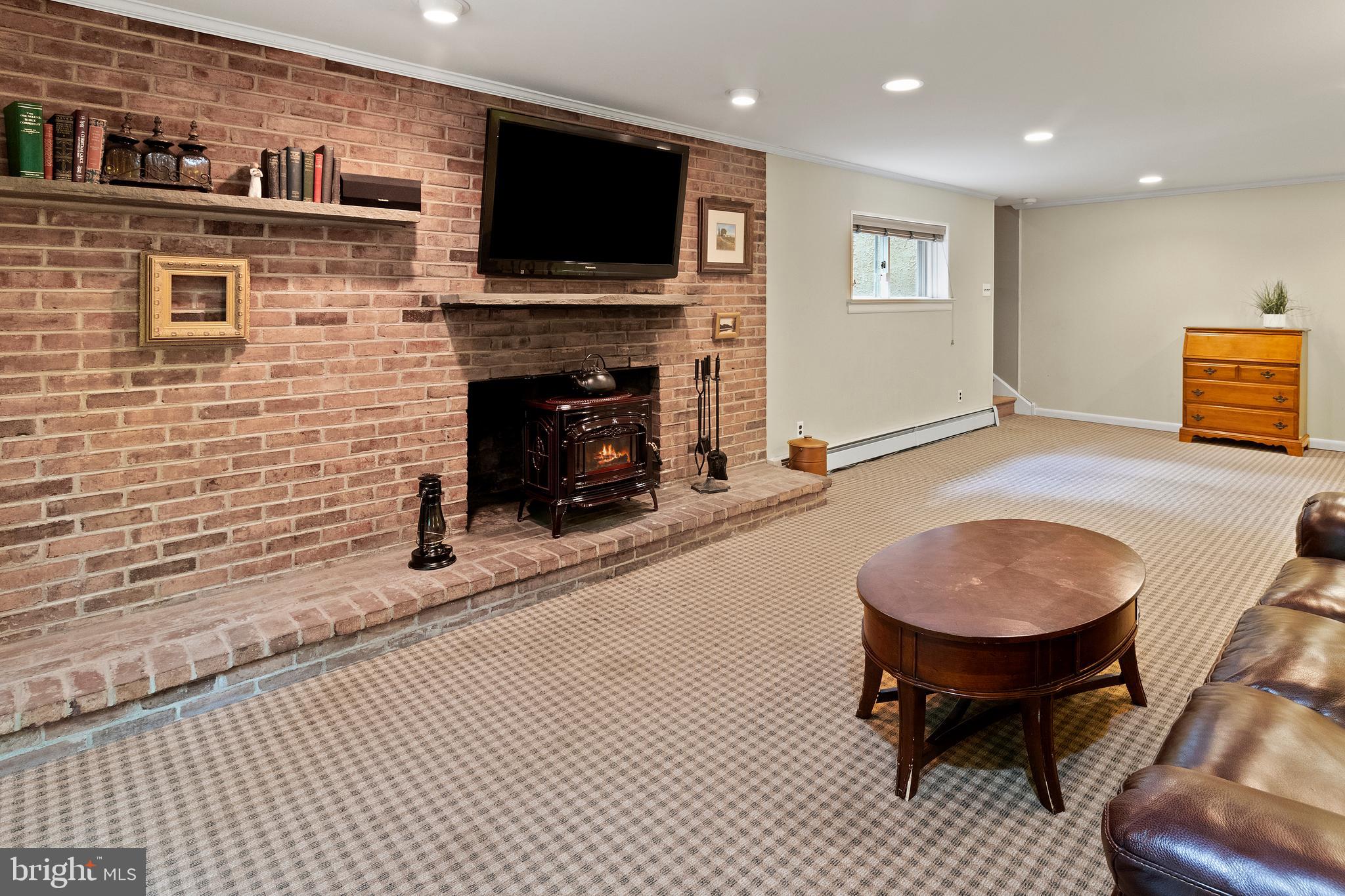 1126 Township Line Road Chalfont, PA 18914 - Photo 23 of 33 With Wood Burning Stove