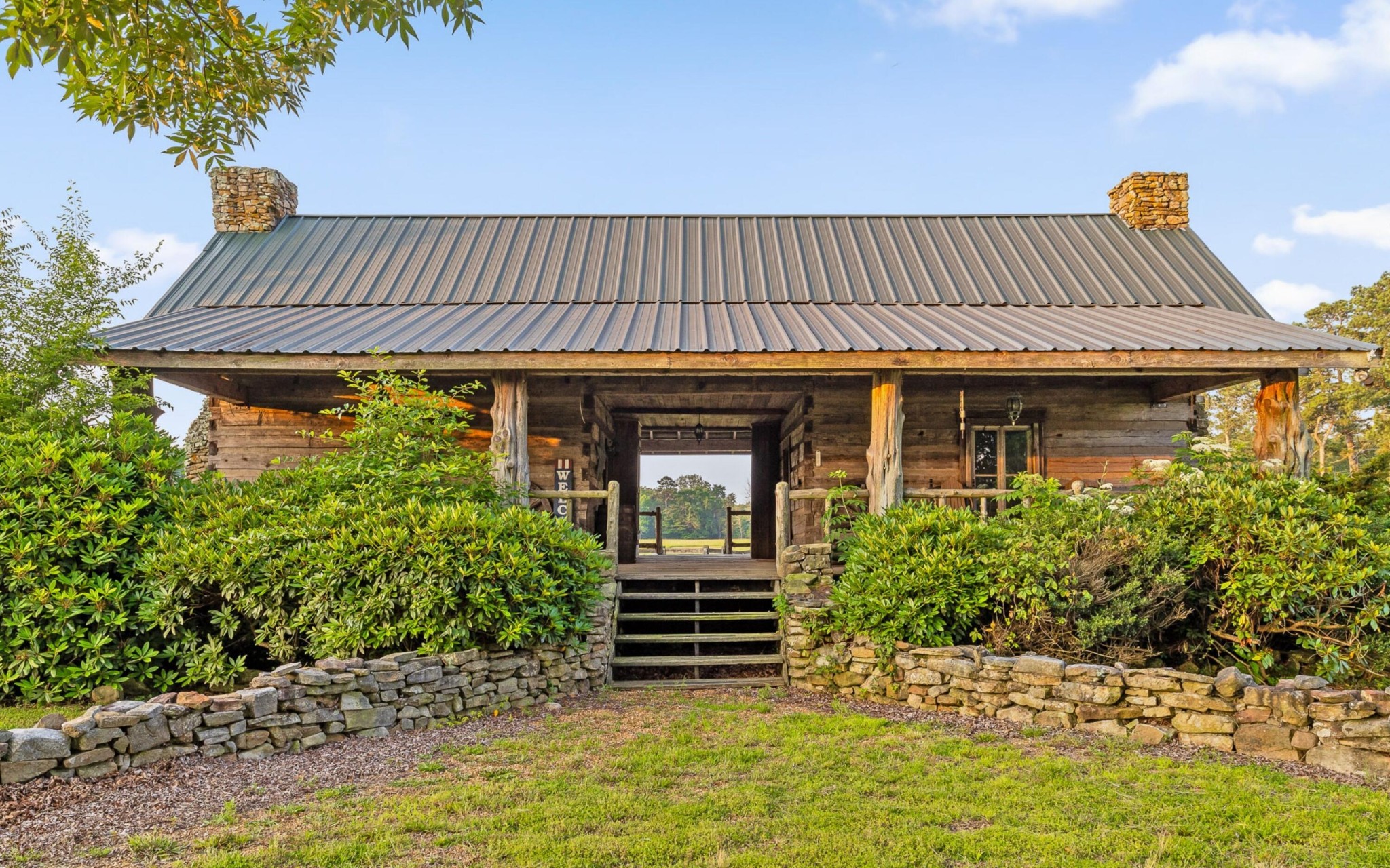 36 Still Hollow Road Menlo, GA 30731 - Photo 15 of 63 a front view of a house with a garden