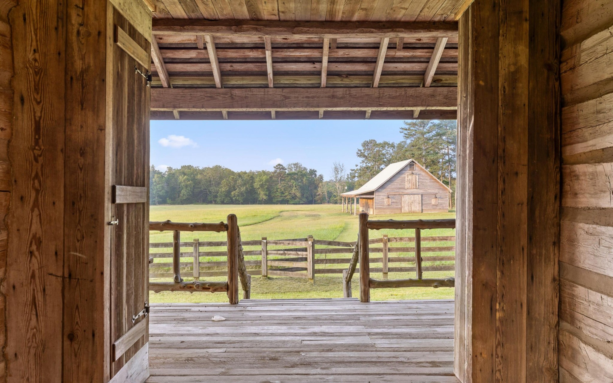36 Still Hollow Road Menlo, GA 30731 - Photo 16 of 63 a view of a balcony with wooden floor and lake view