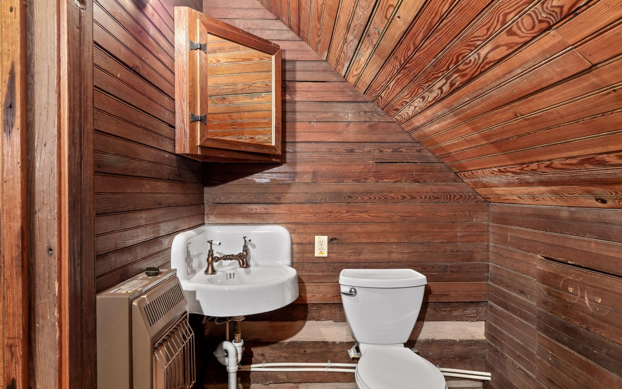 36 Still Hollow Road Menlo, GA 30731 - Photo 26 of 63 a bathroom with a toilet a sink and mirror