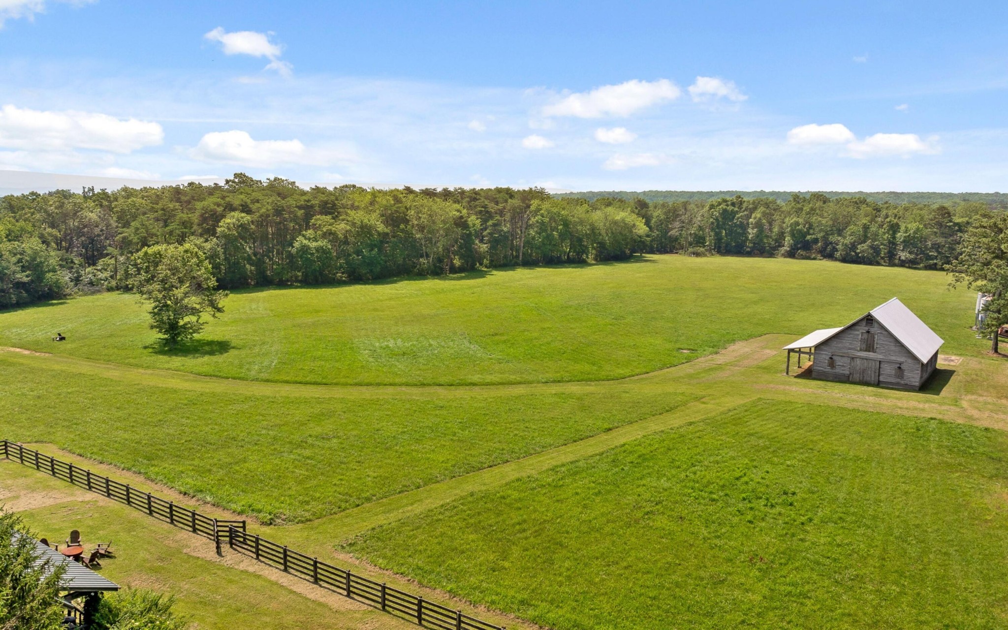 36 Still Hollow Road Menlo, GA 30731 - Photo 39 of 63 a view of a big yard with an outdoor seating and mountain view