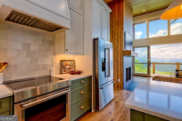 a balcony with furniture and garden view