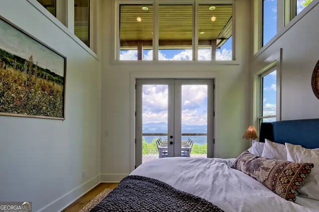 a bedroom with a bed and a walk in closet