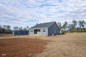 2760 River Meadow Spring Hope, NC 27882 - Photo 38 of 42 front view of a house with a yard