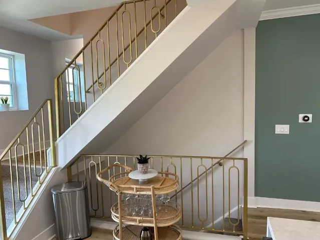 a bathroom with a toilet a sink and shower