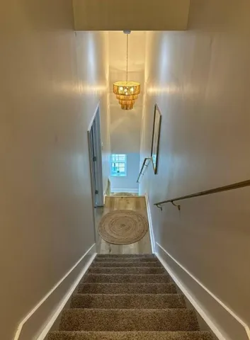 a terrace with outdoor seating and lake view