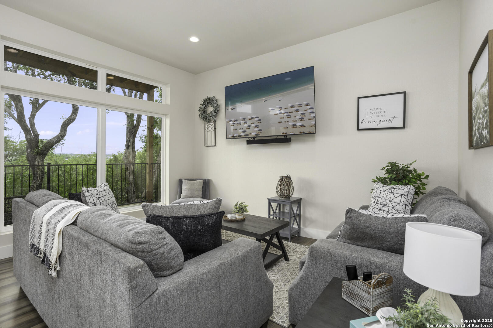 1121 Gruene Road, Unit A New Braunfels, TX 78130 - Photo 11 of 28 a living room with furniture and a large window