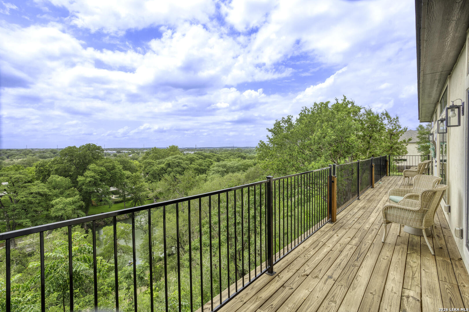 1121 Gruene Road, Unit A New Braunfels, TX 78130 - Photo 2 of 28 a view of balcony with wooden floor and fence