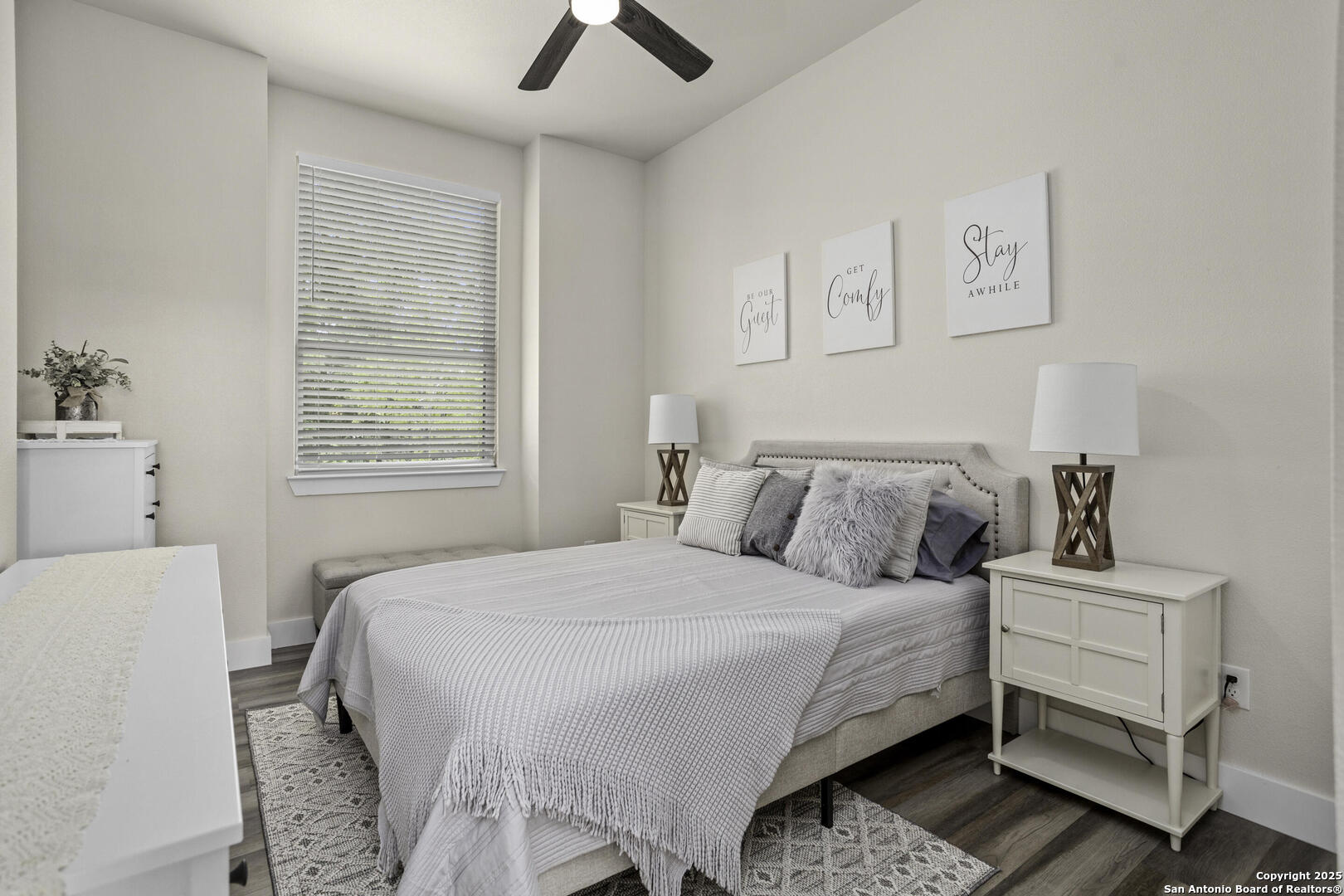 1121 Gruene Road, Unit A New Braunfels, TX 78130 - Photo 24 of 28 a bedroom with a bed and a window