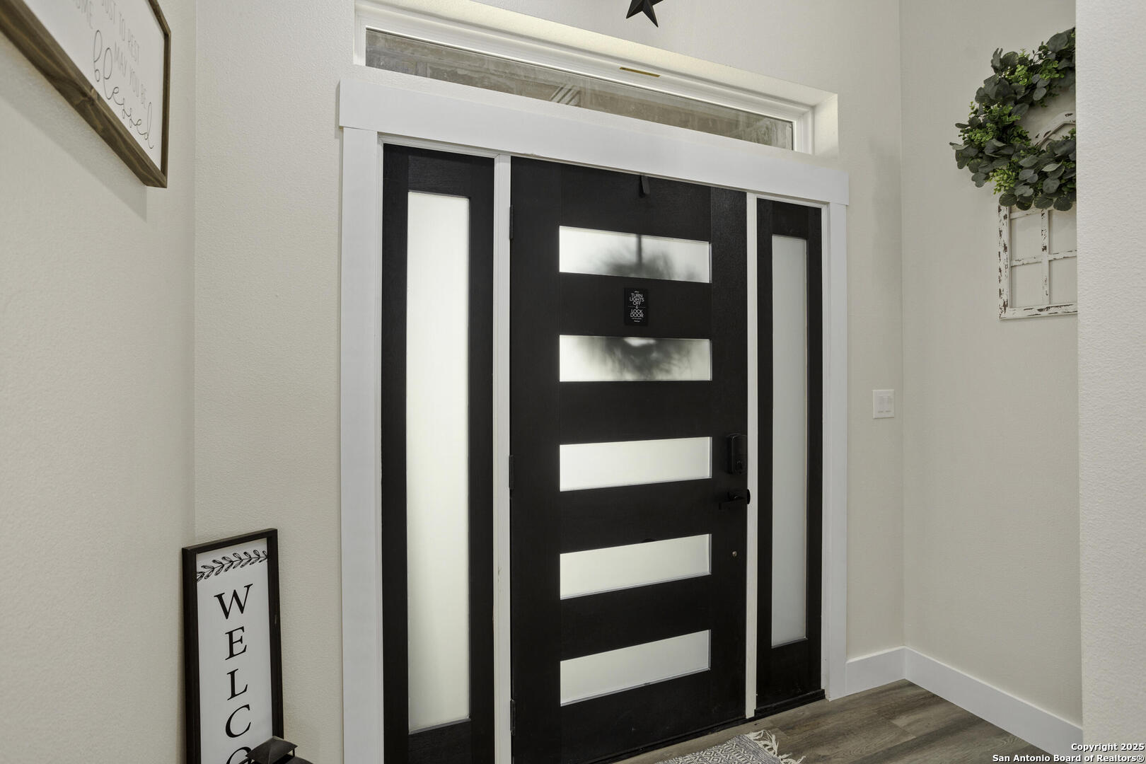 1121 Gruene Road, Unit A New Braunfels, TX 78130 - Photo 4 of 28 a view of a hallway with wooden floor and entryway