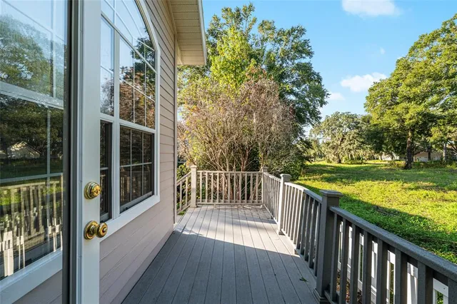 a view of a balcony with lake view