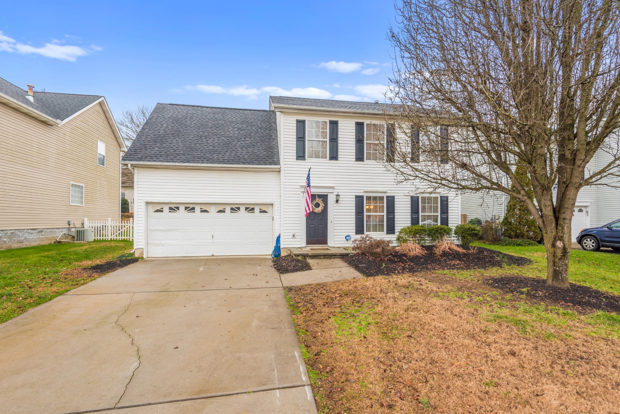 829 Station View Road Knoxville, TN 37919 - Photo 1 of 26 a view of a house with a yard and garage