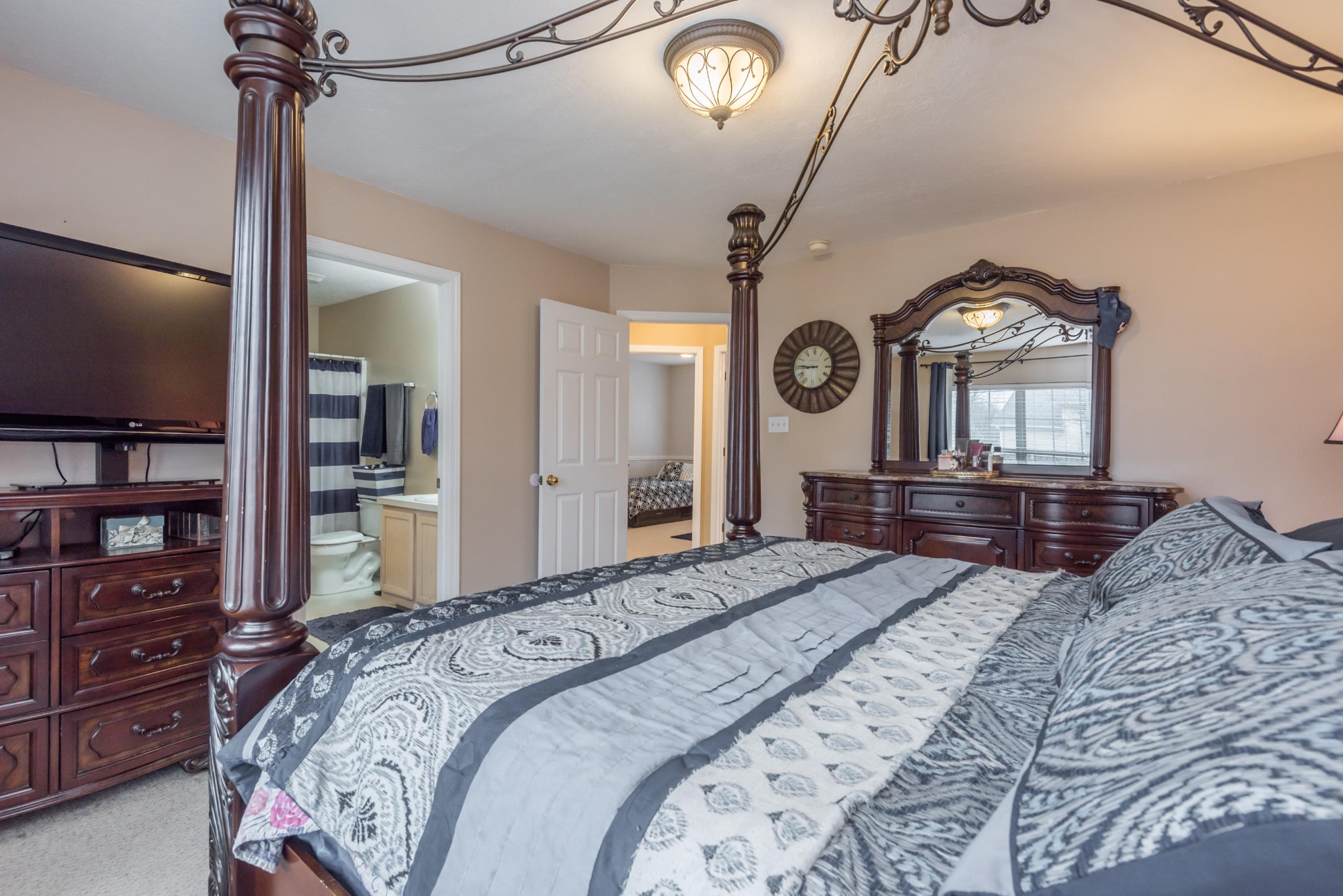 829 Station View Road Knoxville, TN 37919 - Photo 17 of 26 a bedroom with a bed and a television in it