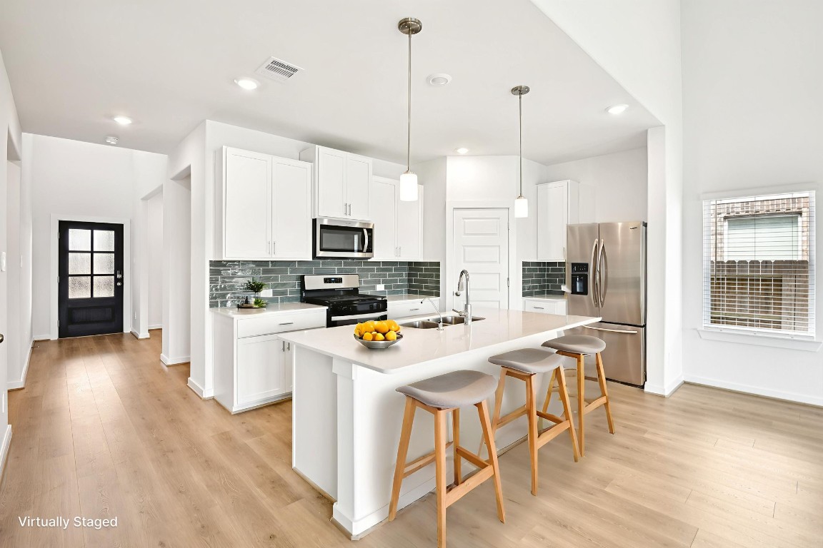 1609 Hopson Ranch Drive Conroe, TX 77301 - Photo 11 of 48 Photo is not of the actual home, but is an inspirational photo of builder’s model home and may depict options, furnishings, and/or decorator features that are not included