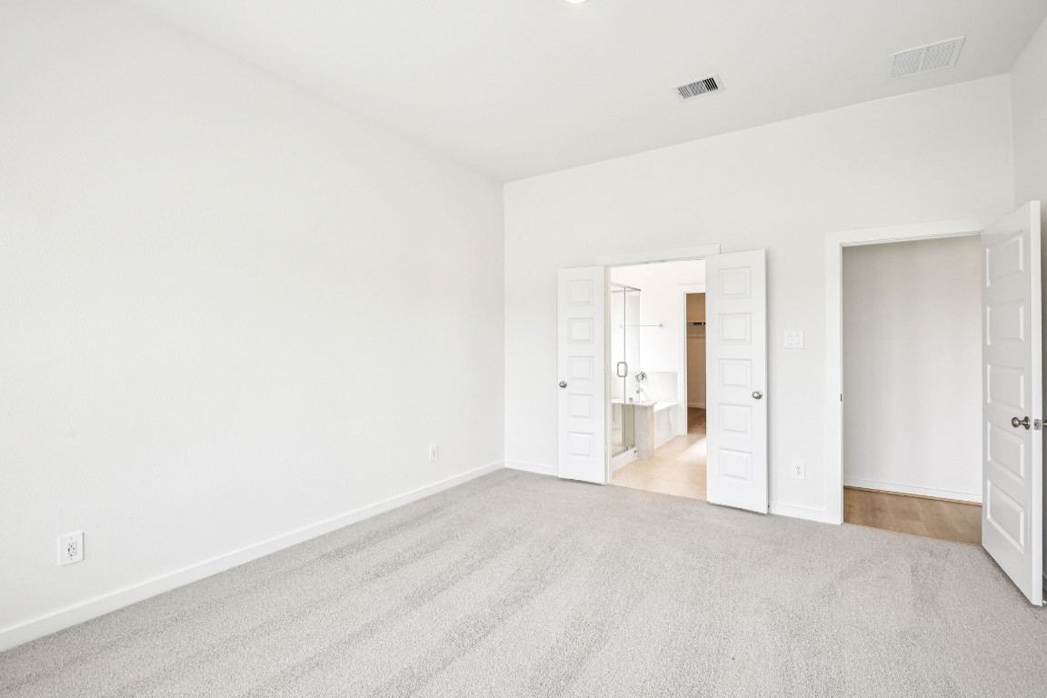 1609 Hopson Ranch Drive Conroe, TX 77301 - Photo 17 of 48 Photo is not of the actual home, but is an inspirational photo of builder’s model home and may depict options, furnishings, and/or decorator features that are not included