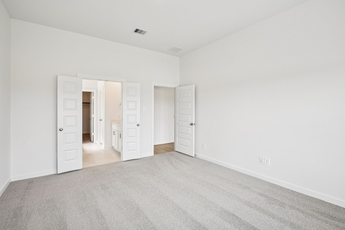 1609 Hopson Ranch Drive Conroe, TX 77301 - Photo 18 of 48 Photo is not of the actual home, but is an inspirational photo of builder’s model home and may depict options, furnishings, and/or decorator features that are not included