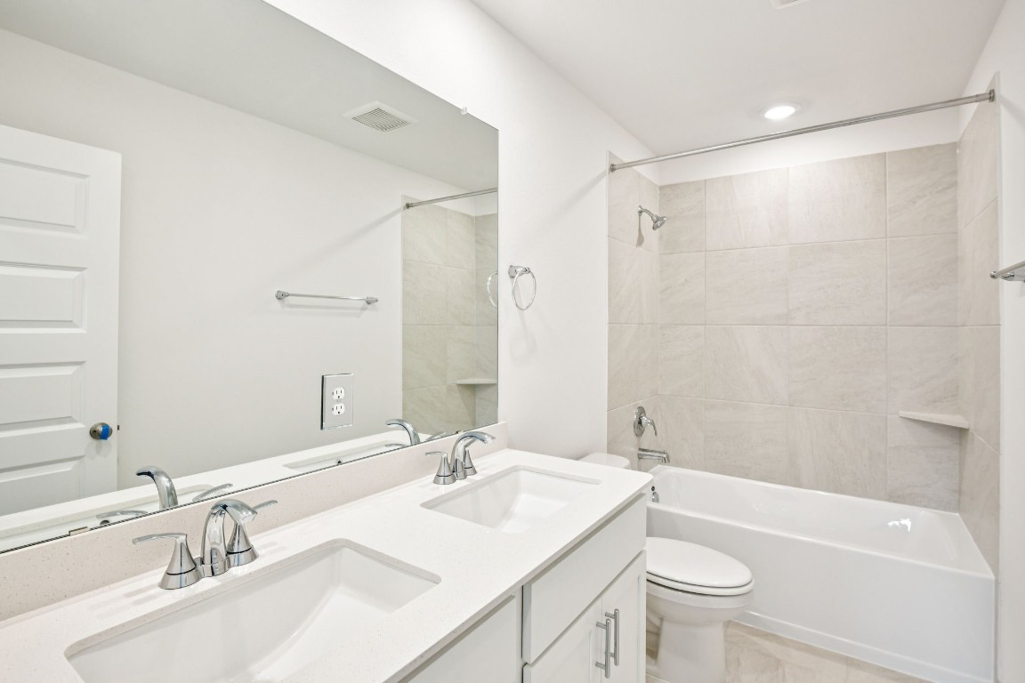 1609 Hopson Ranch Drive Conroe, TX 77301 - Photo 34 of 48 Photo is not of the actual home, but is an inspirational photo of builder’s model home and may depict options, furnishings, and/or decorator features that are not included