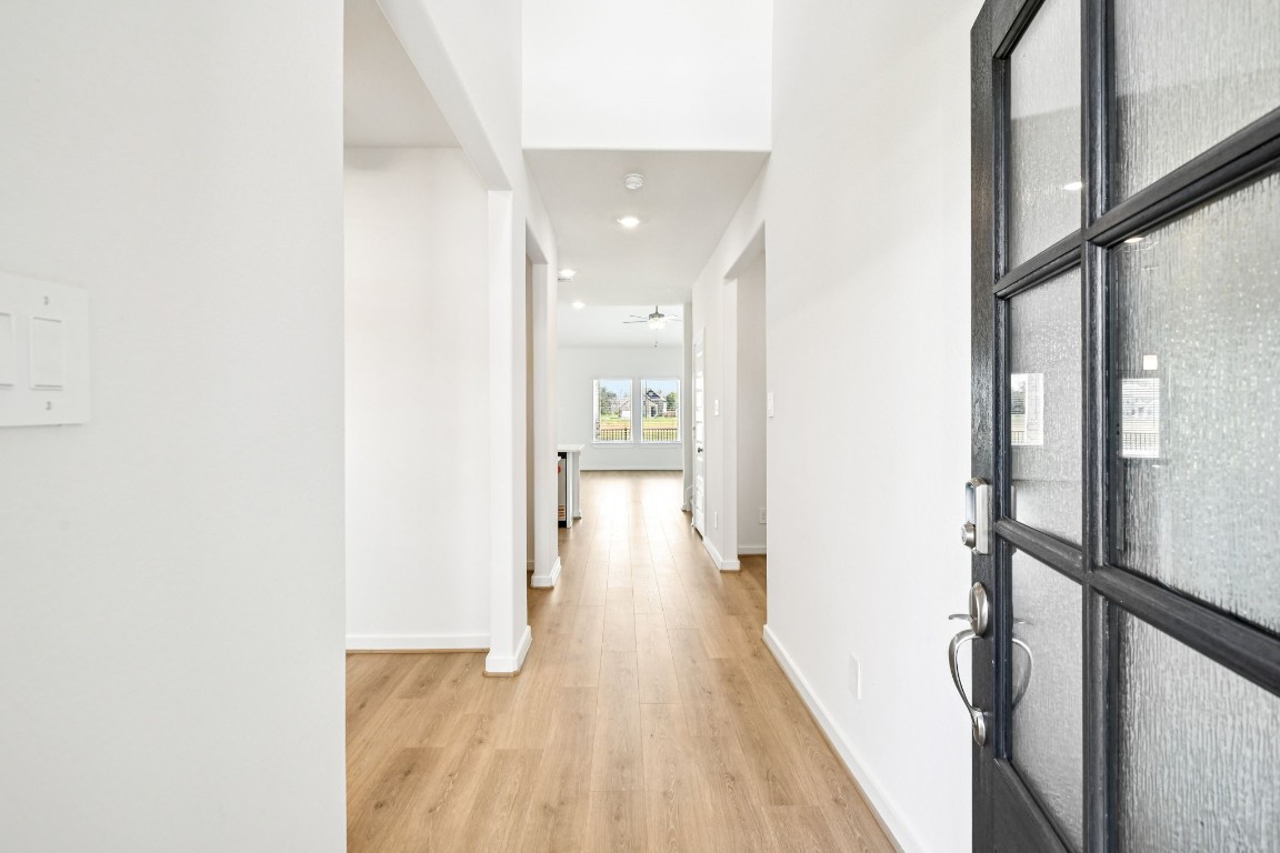 1609 Hopson Ranch Drive Conroe, TX 77301 - Photo 4 of 48 Photo is not of the actual home, but is an inspirational photo of builder’s model home and may depict options, furnishings, and/or decorator features that are not included