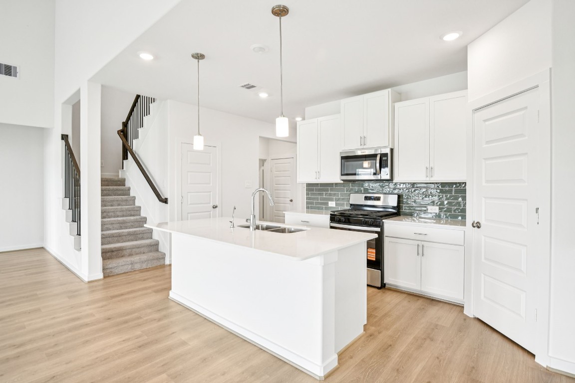 1609 Hopson Ranch Drive Conroe, TX 77301 - Photo 10 of 48 Photo is not of the actual home, but is an inspirational photo of builder’s model home and may depict options, furnishings, and/or decorator features that are not included