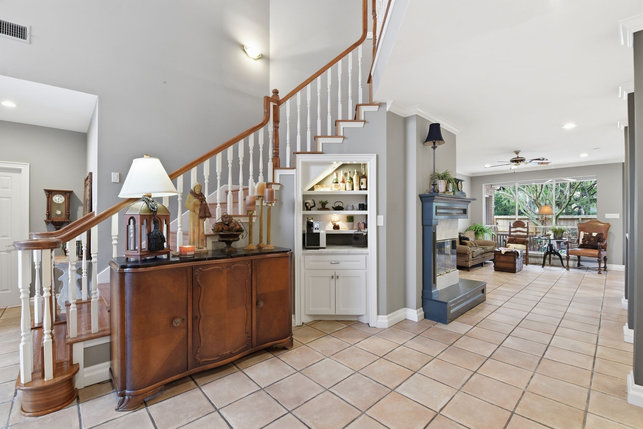 16322 Cranwood Drive Spring, TX 77379 - Photo 26 of 42 Below the stairs is a cut out dry bar area.
