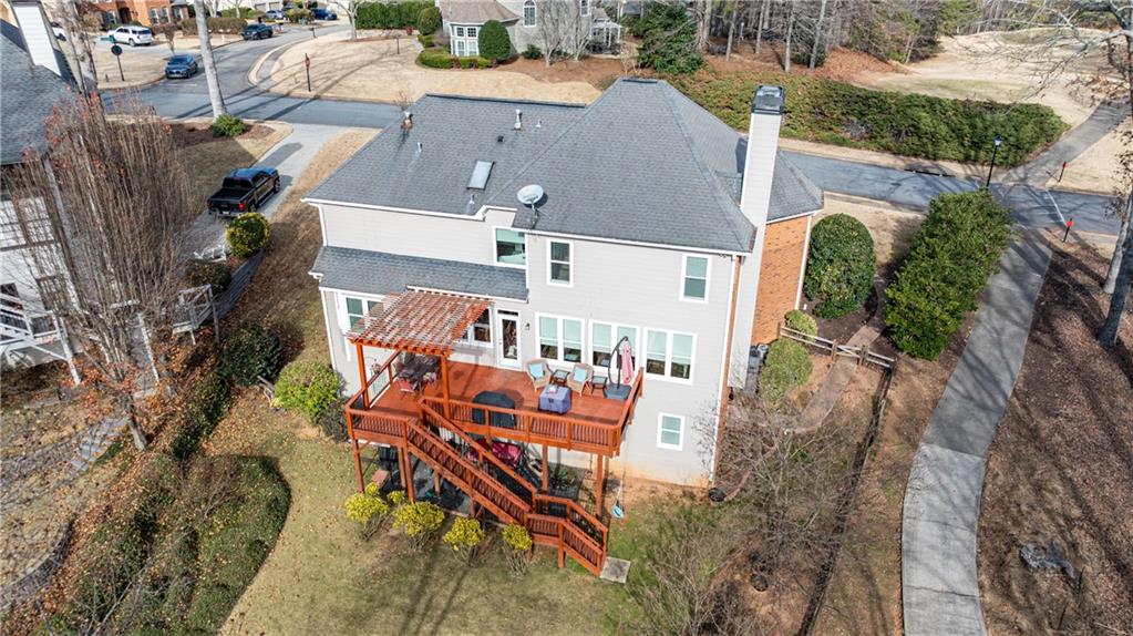 6010 Masters Club Drive Suwanee, GA 30024 - Photo 57 of 65 an aerial view of a house with a yard