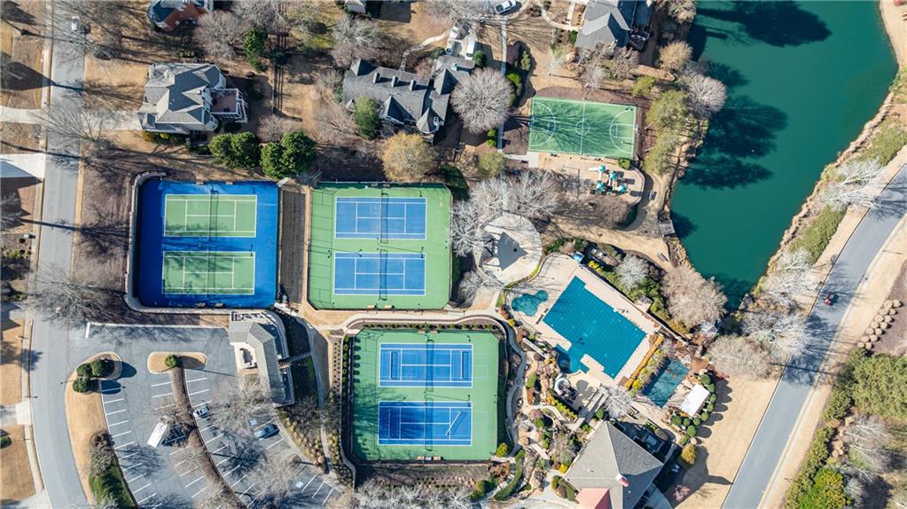 6010 Masters Club Drive Suwanee, GA 30024 - Photo 59 of 65 an aerial view of a house with a yard and outdoor seating