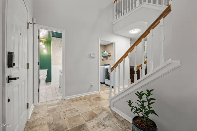 a view of entryway with a front door