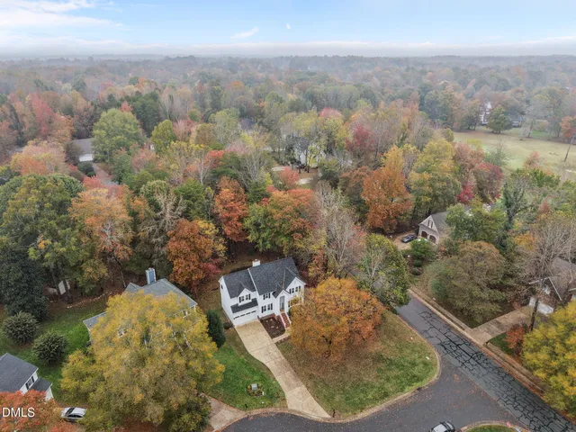 a view of a bathroom with sink and mirror
